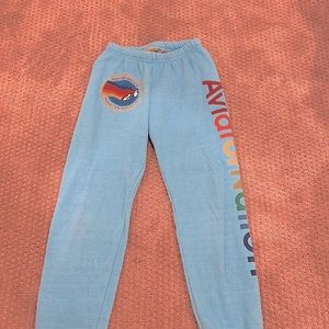 Selling a Blue pair of Aviator nation sweatpants!! It fits in a xs!!